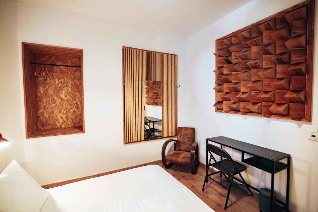 Quarto Duplo com Casa de Banho Partilhada